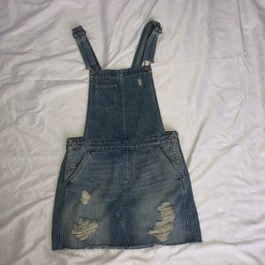 Distressed denim skirt overalls